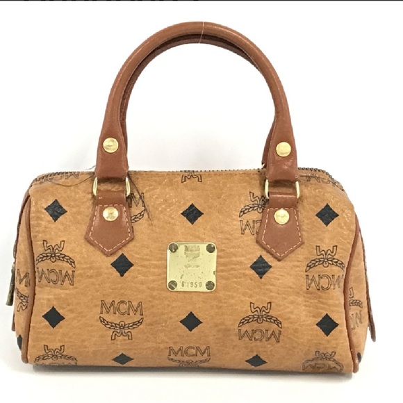 MCM Handbags - Authentic MCM Other Mini Hands Handbags